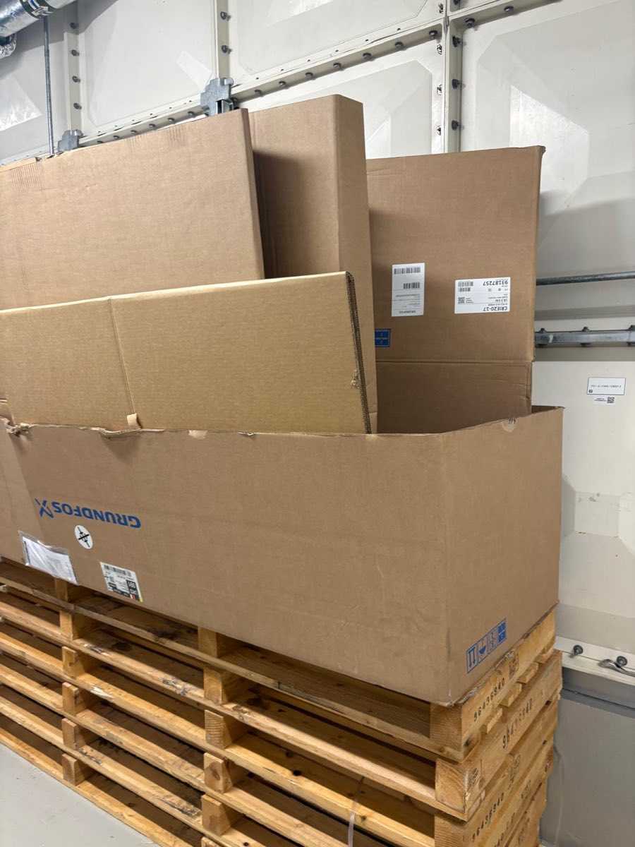 Cardboard packaging on pallets ready for recycling